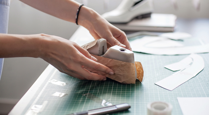Person designer sko