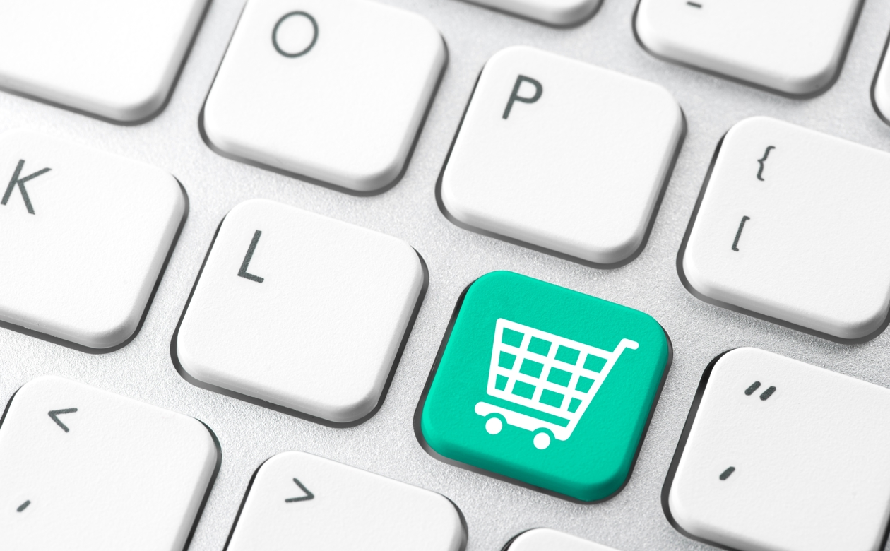 Tastatur med grøn tast med indkøbsvogn på - online shopping