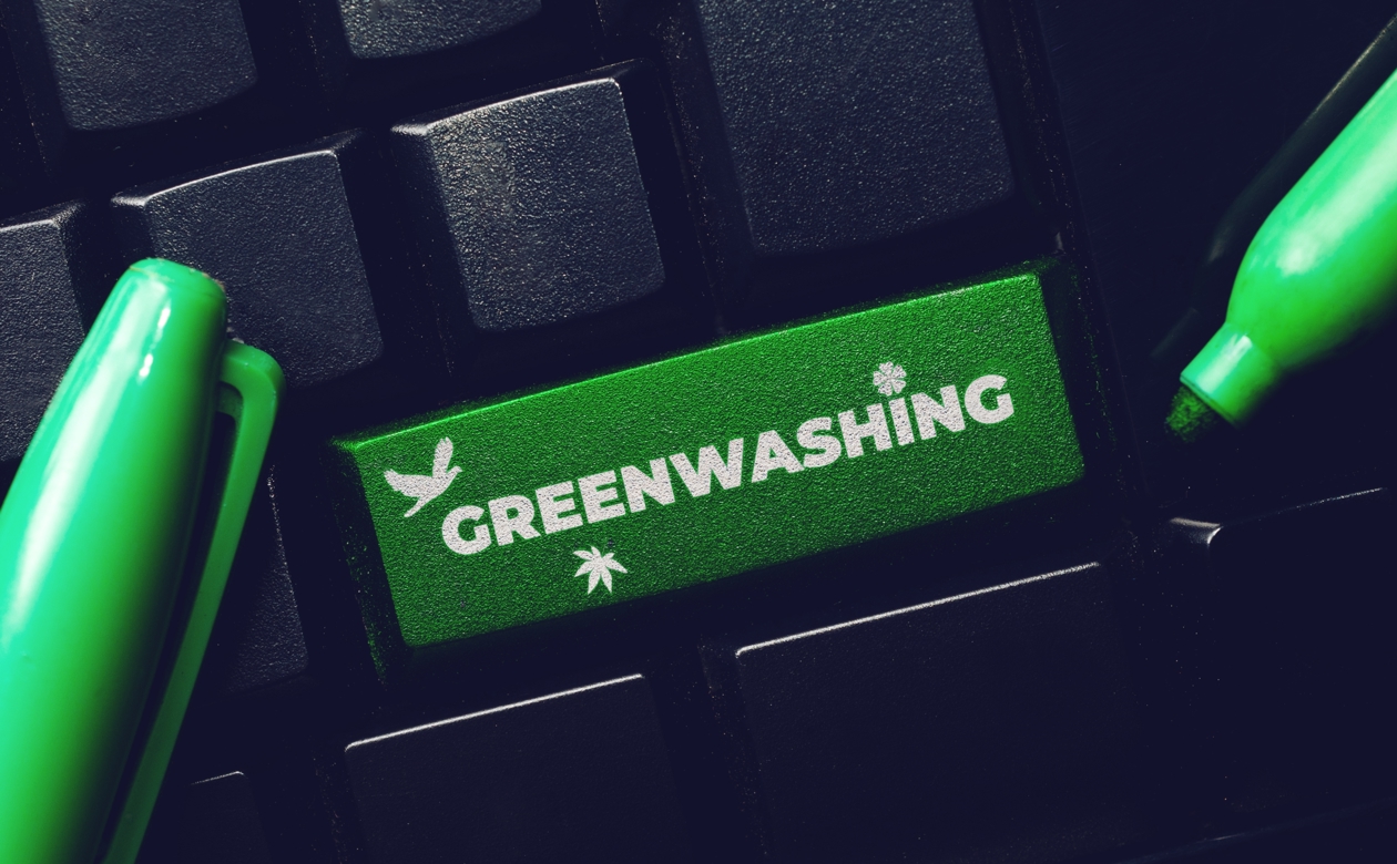 Grøn tastaturknap med med teksten Greenwashing på